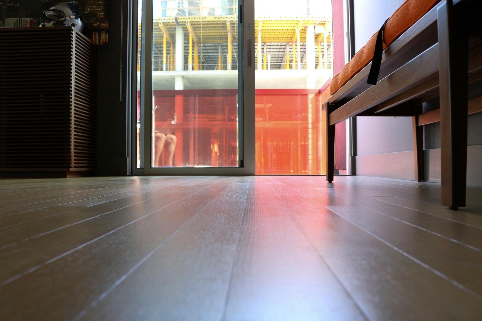 A modern room with newly laid wood flooring